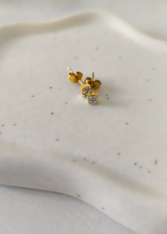 Boucles d'oreilles puce doré avec un zirconium en acier inoxydable