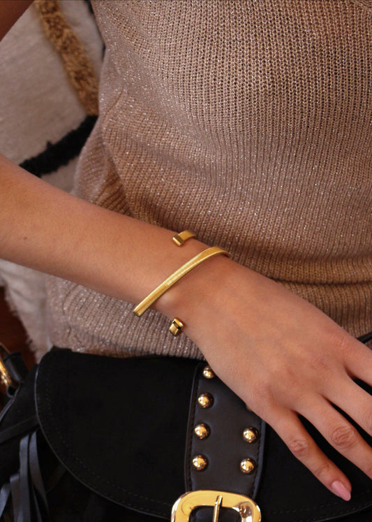 Bracelet double tour serpenté en acier inoxydable doré